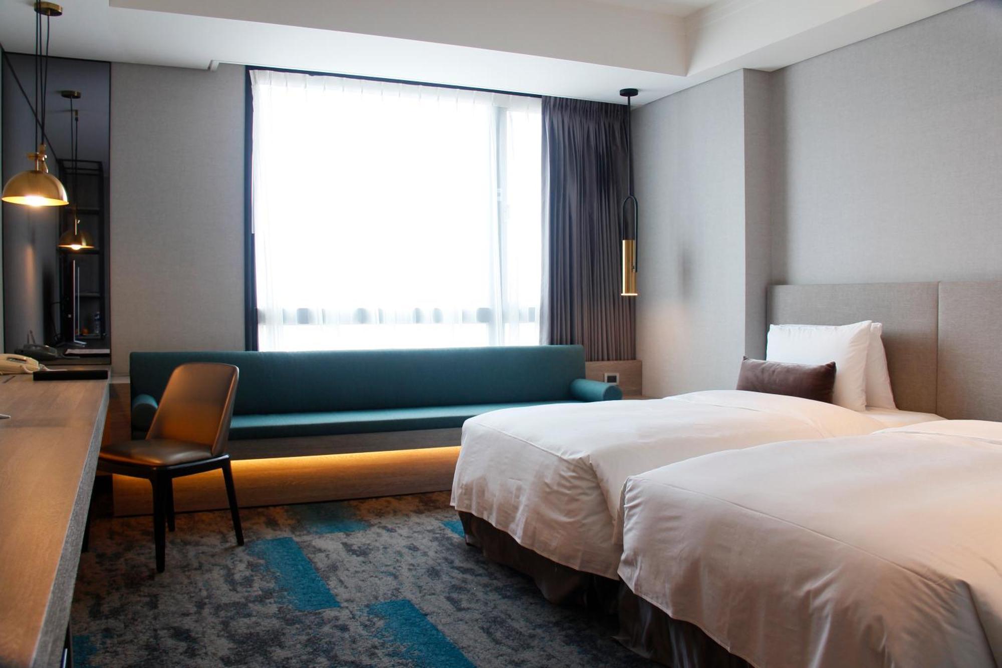 טאינאן Queena Plaza Hotel מראה חיצוני תמונה