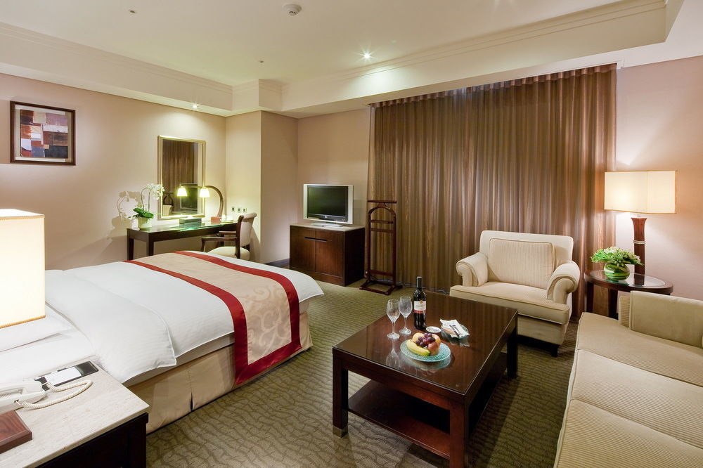 טאינאן Queena Plaza Hotel מראה חיצוני תמונה