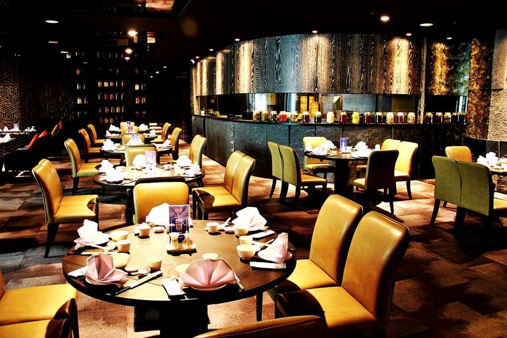טאינאן Queena Plaza Hotel מסעדה תמונה